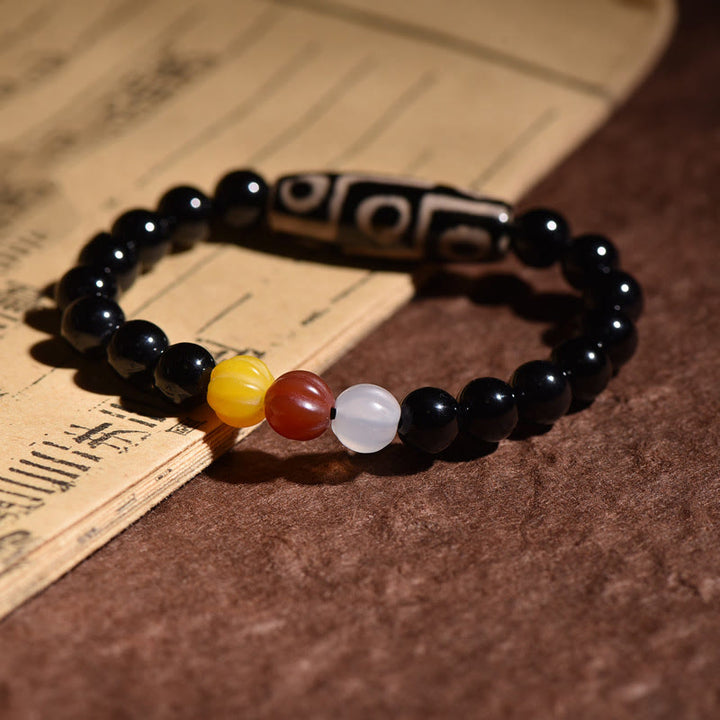 Pulsera de poder de riqueza con cuentas Dzi de nueve ojos naturales tibetanas de Buddha Stones