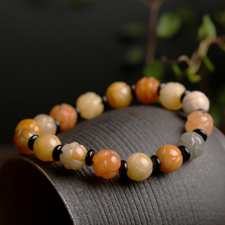 Pulsera de suerte y riqueza de loto de jade de seda dorada