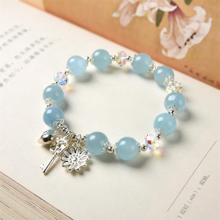 Pulsera con dije de llave de amor con flor de serenidad de aguamarina natural de plata de ley 925