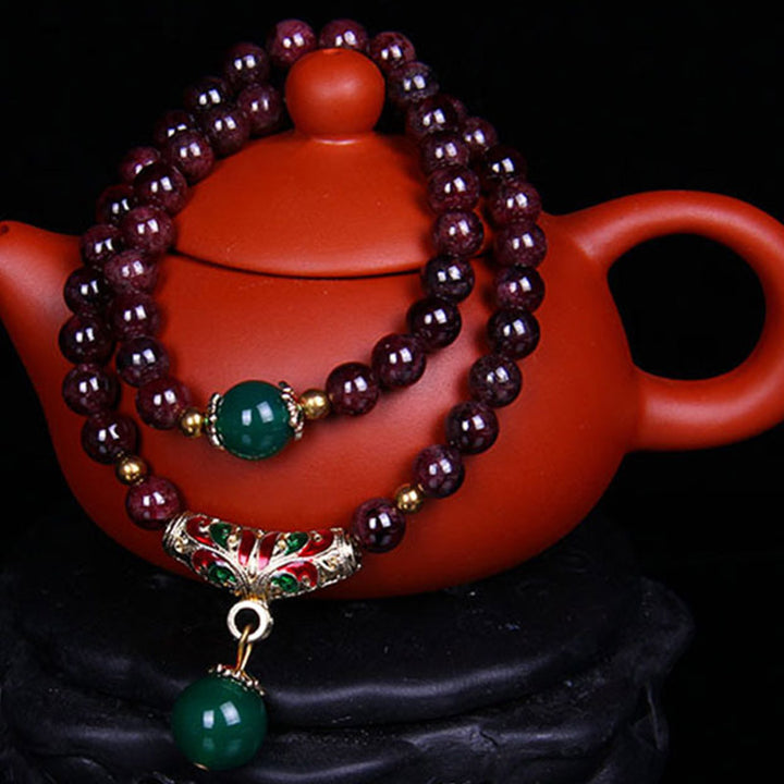 Pulsera de bendición de granate natural con Buddha Stones