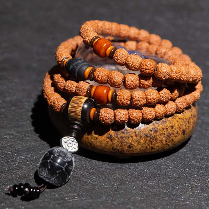 Tíbet 108 Mala cuentas Rudraksha Bodhi semilla zodiaco chino Buda Natal pulsera con dijes de riqueza