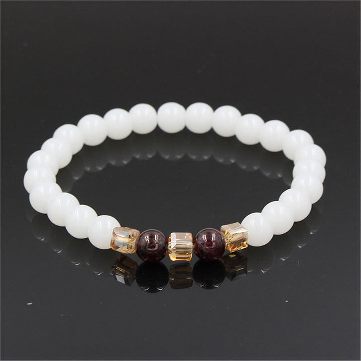 Pulsera de protección de jade blanco natural con Buddha Stones