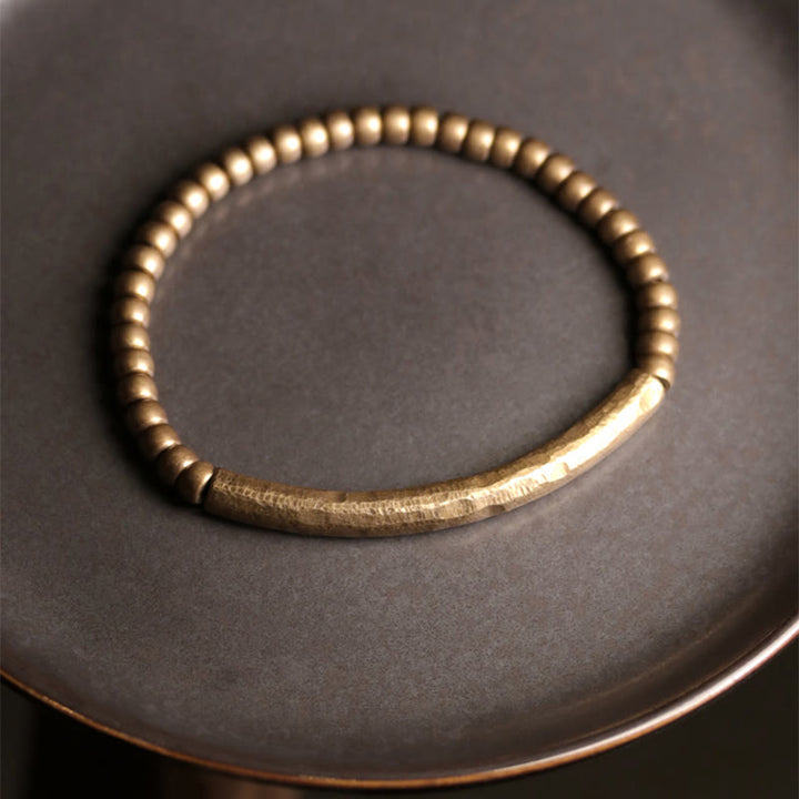 Pulsera de la riqueza de la suerte con cuentas de cobre y latón de diseño simple de Buddha Stones