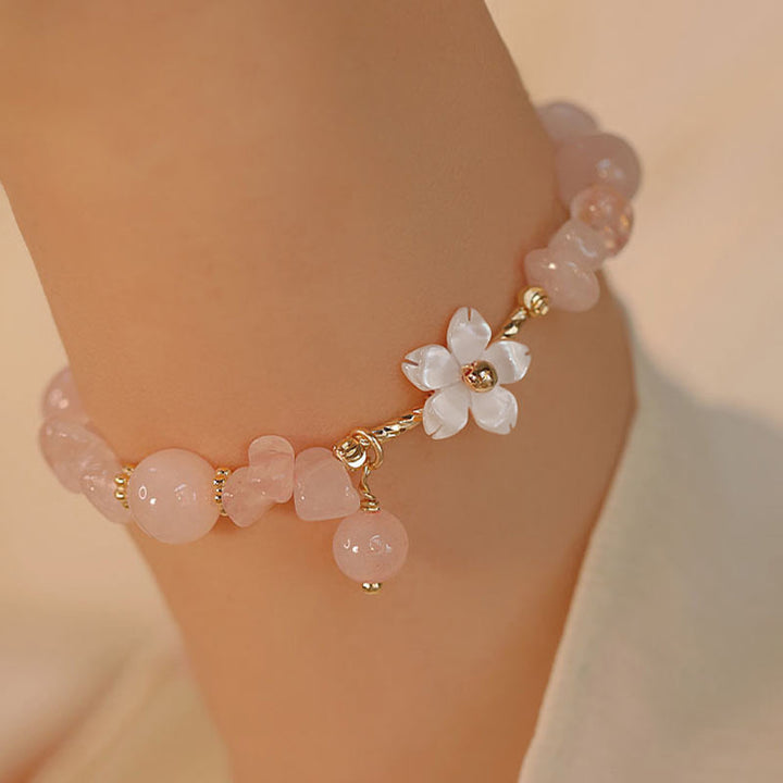 Pulsera de amor con flor de cristal rosa natural chapada en oro de 14 quilates con Buddha Stones