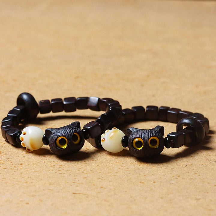 Buddha Stones Madera de ébano Lindo gato Bodhi Semilla Pata Garra Cuentas cuadradas Pulsera tranquila - image 4