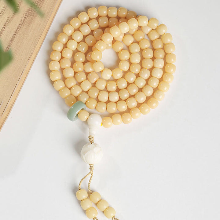 Pulsera con dije de armonía y paz con cuentas de loto y semilla de Bodhi Natural de Buddha Stones