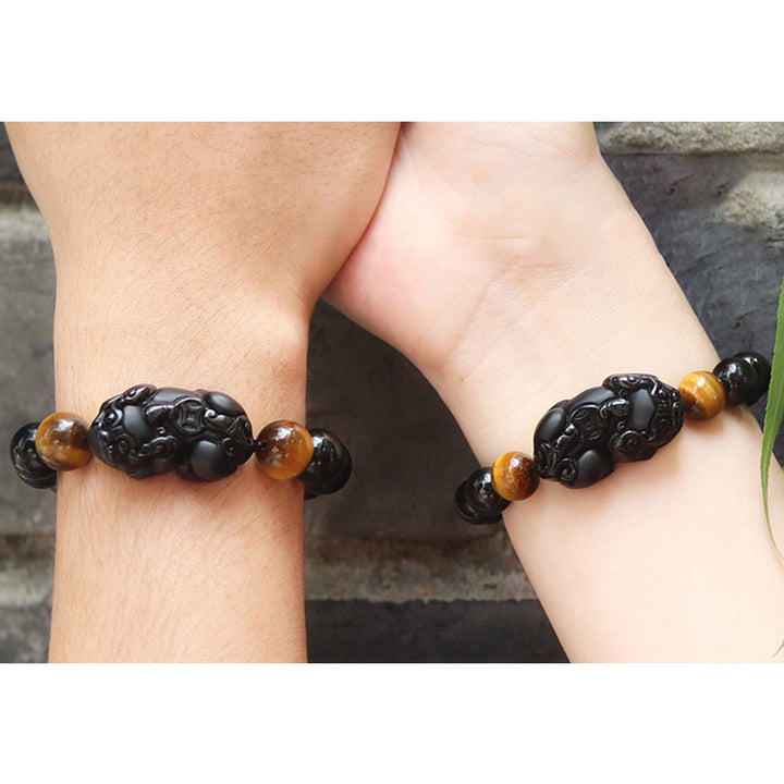 Pulsera de riqueza de ojo de tigre de obsidiana arcoíris FengShui PiXiu de Buddha Stones