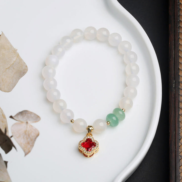 Buddha Stones Ágata blanca natural Ágata roja Bolsa de dinero Personaje Fu Pulsera de protección de trébol de cuatro hojas
