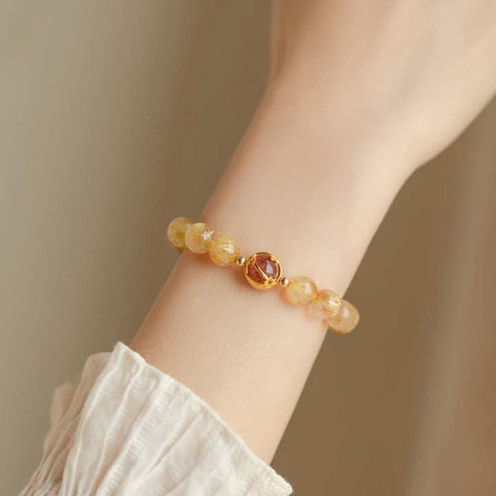 Pulsera de protección de estrella de cuarzo fresa de cuarzo rutilado dorado con Buddha Stones
