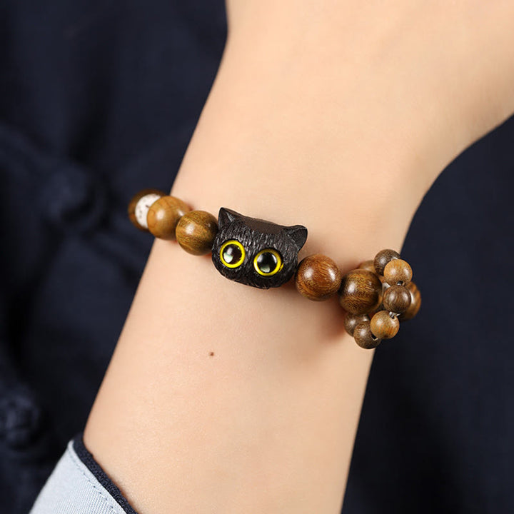 Pulsera calmante de la paz del gato de madera de ébano del sándalo verde de las Buddha Stones - image 3