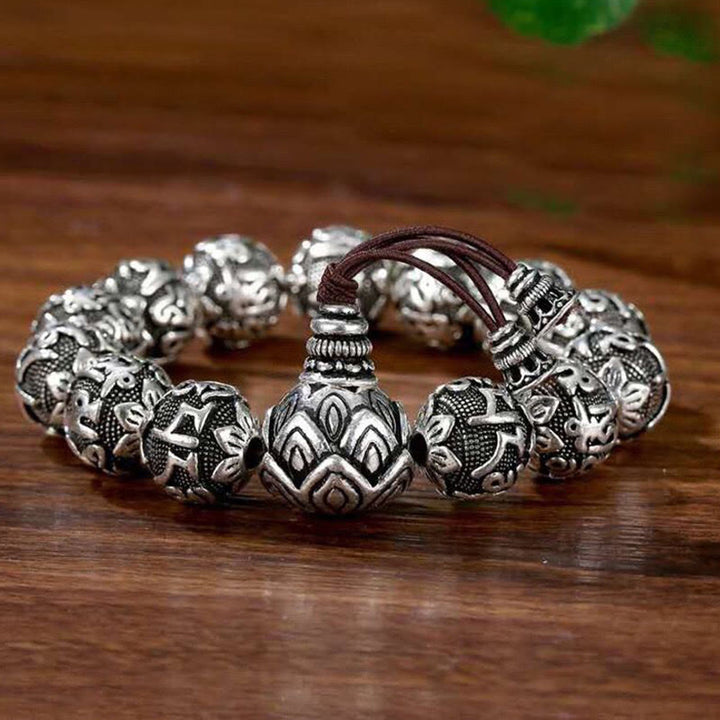 Pulsera de amuleto de cuentas de aleación tallada Om Mani Padme Hum tibetano con Buddha Stones