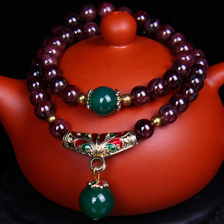 Pulsera de bendición de granate natural con Buddha Stones
