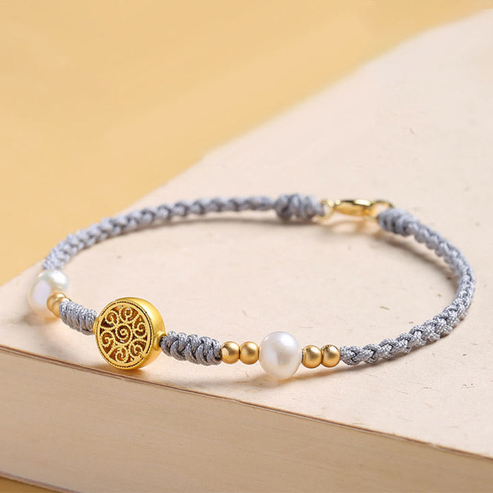 Pulsera trenzada de cuerda azul con Buddha Stones, moneda de cobre, árbol de la fortuna, perla, suerte