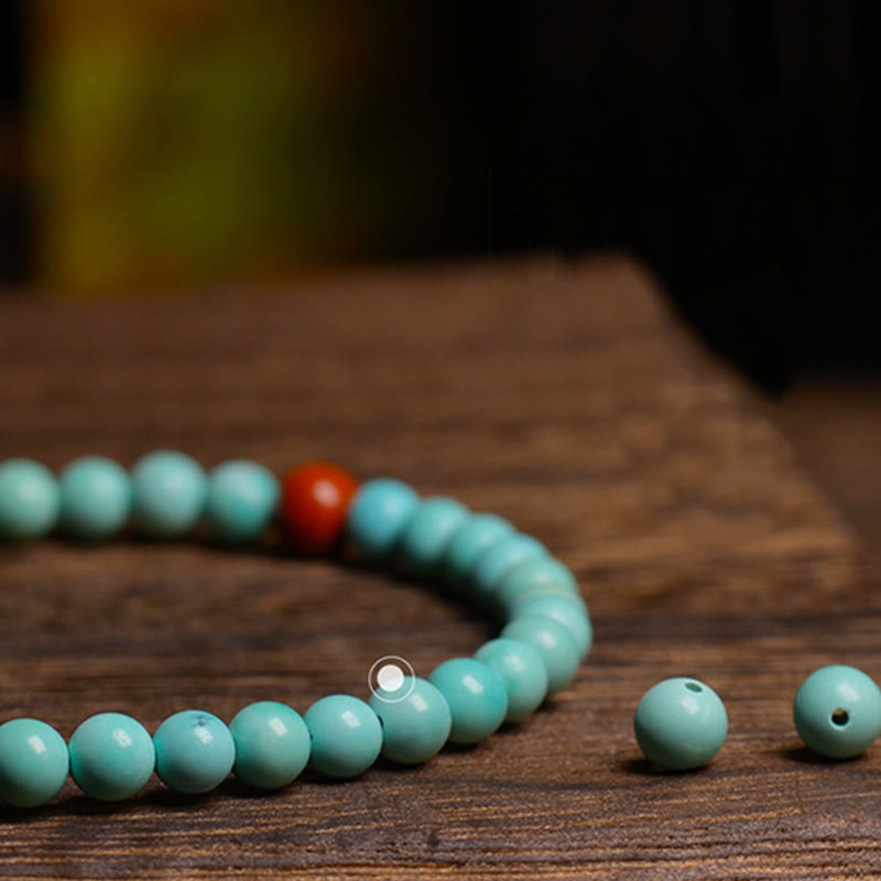 Pulsera de protección de cuentas de ágata roja turquesa de Buddha Stones - image 5