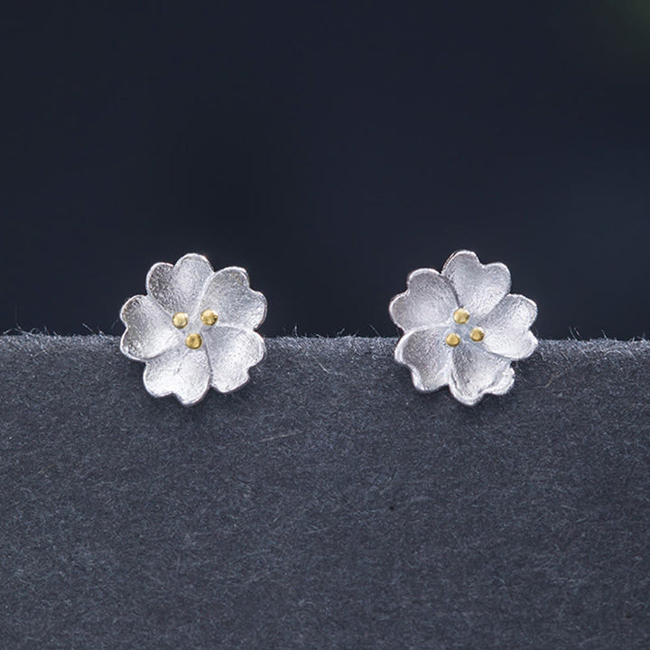 Pendientes de tuerca con diseño floral de flores de cerezo en plata de ley 925 de Buddha Stones