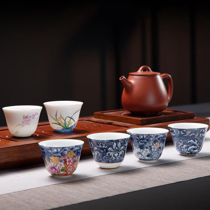 Taza de té de cerámica de porcelana azul y blanca, Buddha Stones, flores coloridas, orquídeas, olas del mar, taza de té de Kung Fu