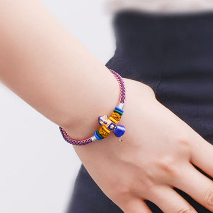 Pulsera tibetana hecha a mano Dorje Vajra fuerza ocho hilos cuerda