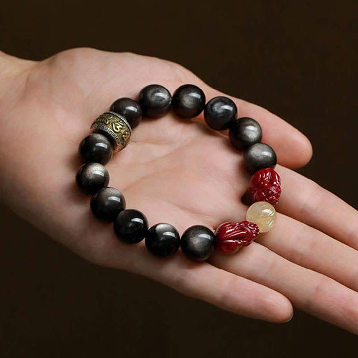 Pulsera de protección Om Mani Padme Hum de cinabrio PiXiu de obsidiana con brillo dorado de Buddha Stones