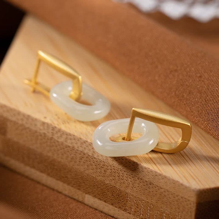 Pendientes de bendición de la felicidad de jade blanco redondo de plata de ley 925 con Buddha Stones