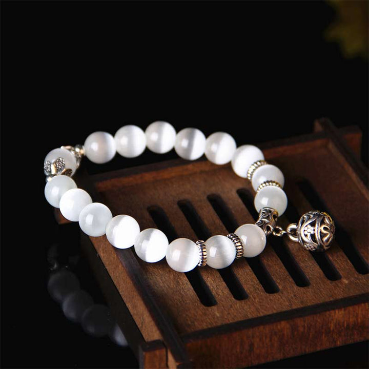 Pulsera de la suerte con ojo de gato tibetano y Buddha Stones