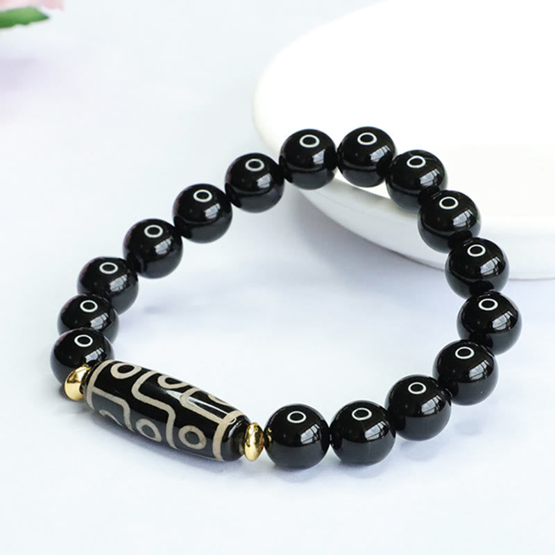 Pulsera de poder de ónix negro con cuentas Dzi tibetanas de nueve ojos de Buddha Stones