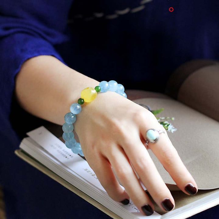 Pulsera curativa de serenidad con cuentas de ámbar y aguamarina natural