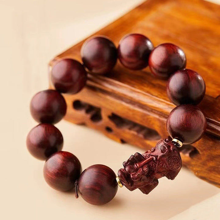 Pulsera de protección PiXiu de sándalo rojo de hoja pequeña con Buddha Stones