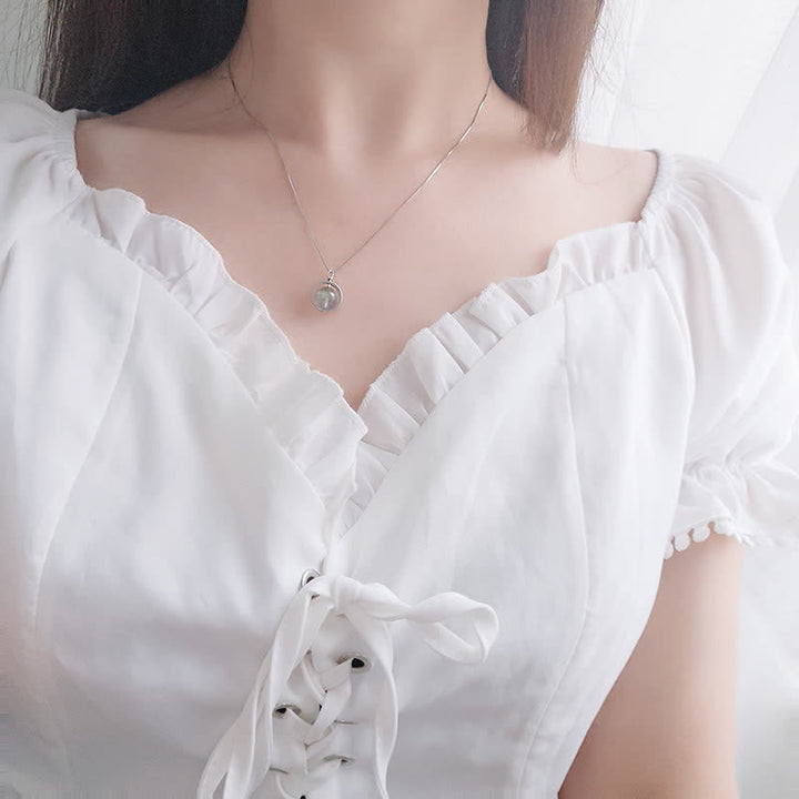 Collar con colgante giratorio con diseño de planeta del amor, piedra lunar de plata de ley 925 con Buddha Stones