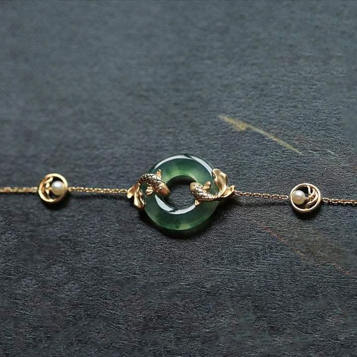 Pulsera de armonía curativa con peces Koi de jade cian y Buddha Stones