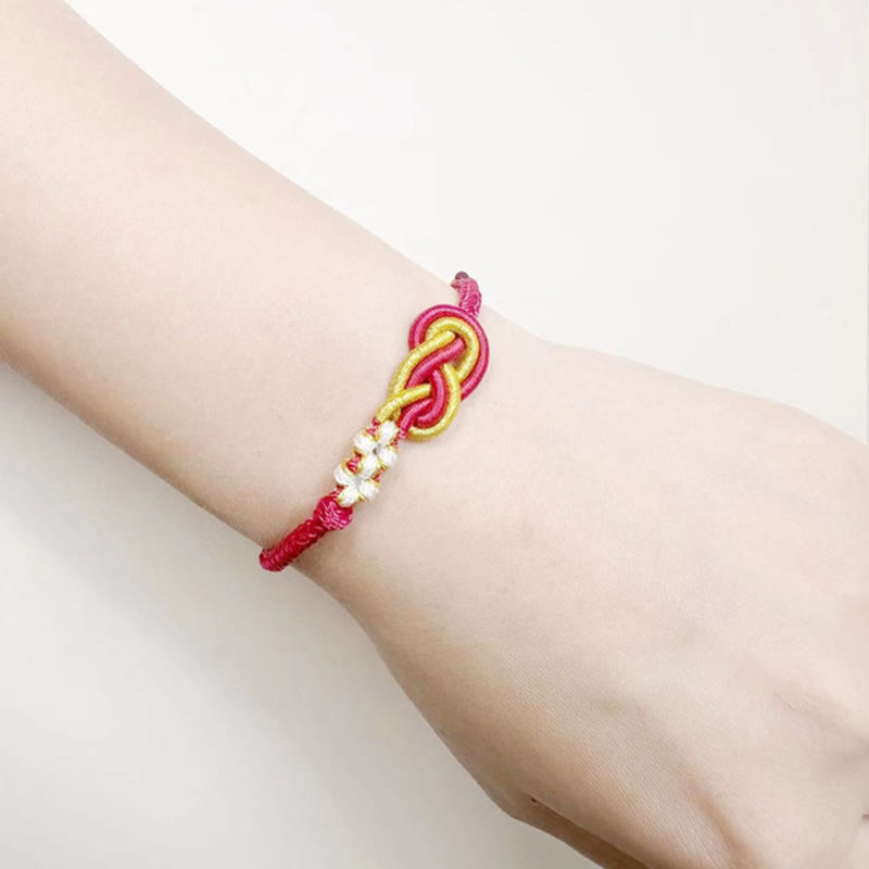 Pulsera de conexión de suerte con nudo de flor de melocotón, nudo de paz de ocho hilos hecho a mano con Buddha Stones