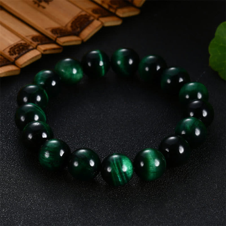 Pulsera de fuerza de ojo de tigre verde natural con Buddha Stones