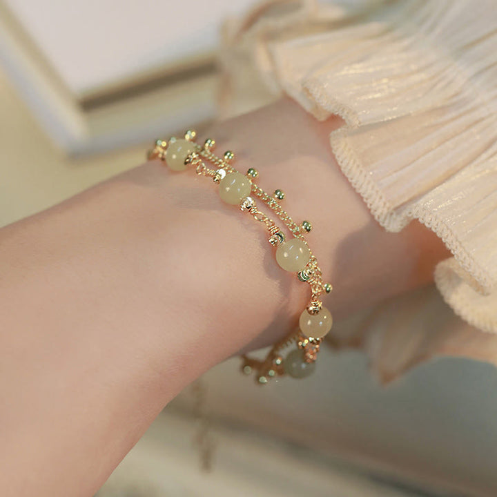 Pulsera de prosperidad de la suerte con cuentas de jade hetiano de 2 capas chapada en oro de 14 quilates