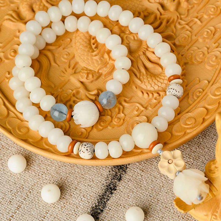 Pulsera de bendición de loto Bodhi de jade blanco tibetano con Buddha Stones