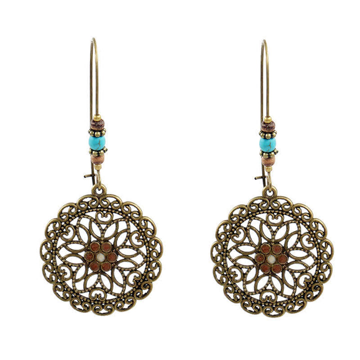 Pendientes colgantes redondos de la suerte con diseño de flores