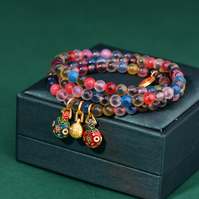 Pulsera de triple envoltura con dije de fuerza familiar de bestia tragadora de oro con ágata de caramelo colorida y Buddha Stones