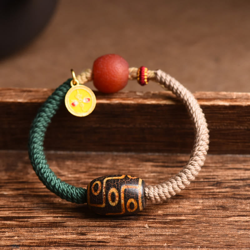Pulsera de cuerda de riqueza con cuentas Dzi tibetanas de nueve ojos hechas a mano con Buddha Stones