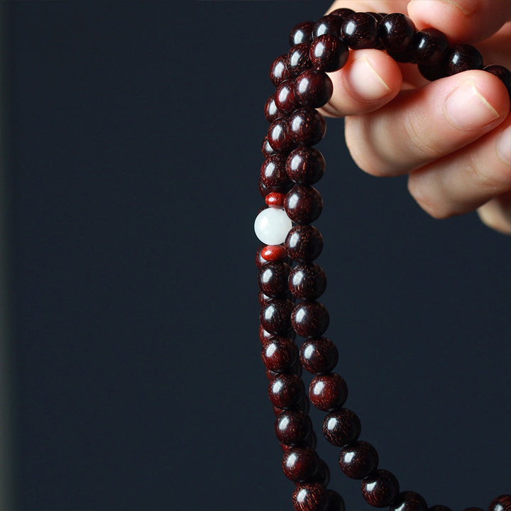 Pulsera de equilibrio Mala de loto de sándalo rojo de hoja pequeña tibetana con Buddha Stones