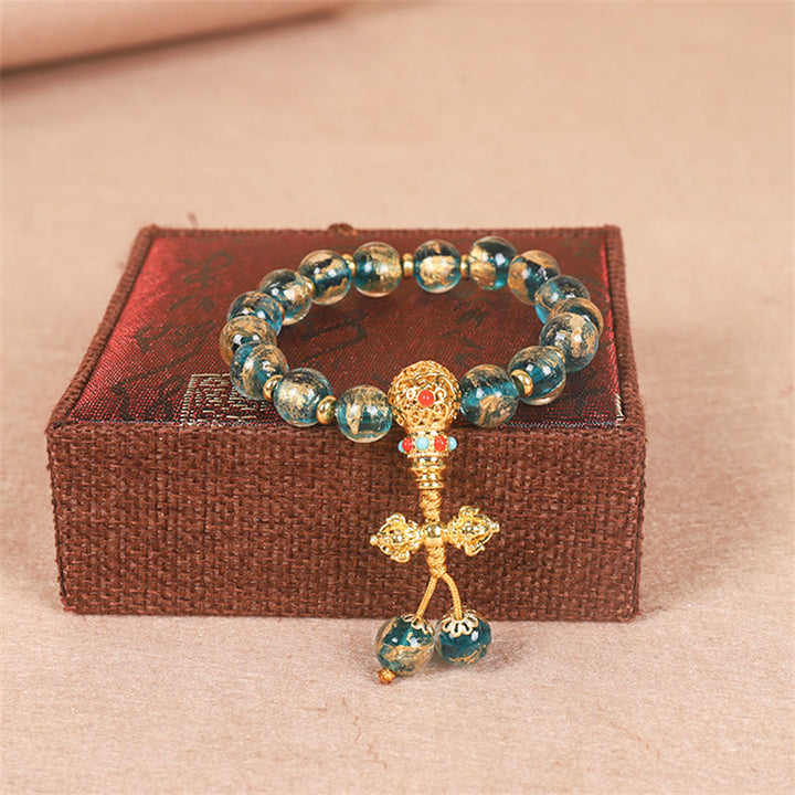 Pulsera de cuentas de fuerza Dorje Vajra de la familia de bestias que tragan oro tibetano con Buddha Stones