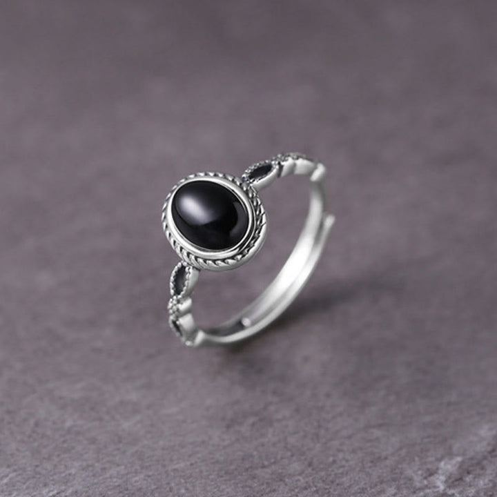 Anillo de la fortuna de ónix negro de plata de ley 925 con Buddha Stones