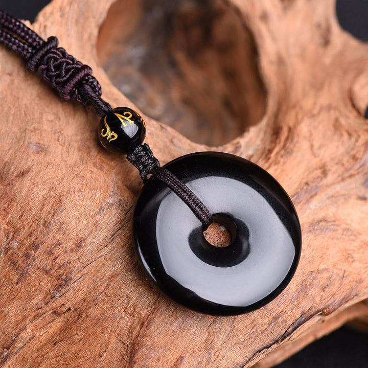 Collar de protección de obsidiana tibetana con Buddha Stones