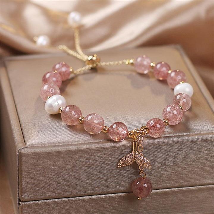 Pulsera curativa con dije de cola de pez de cuarzo rutilado de cuarzo fresa con Buddha Stones