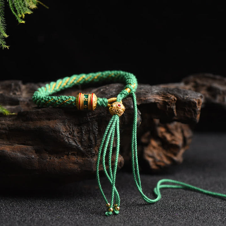 Pulsera de cuerda colorida con cuentas de rueda de oración de la suerte hecha a mano tibetana con Buddha Stones