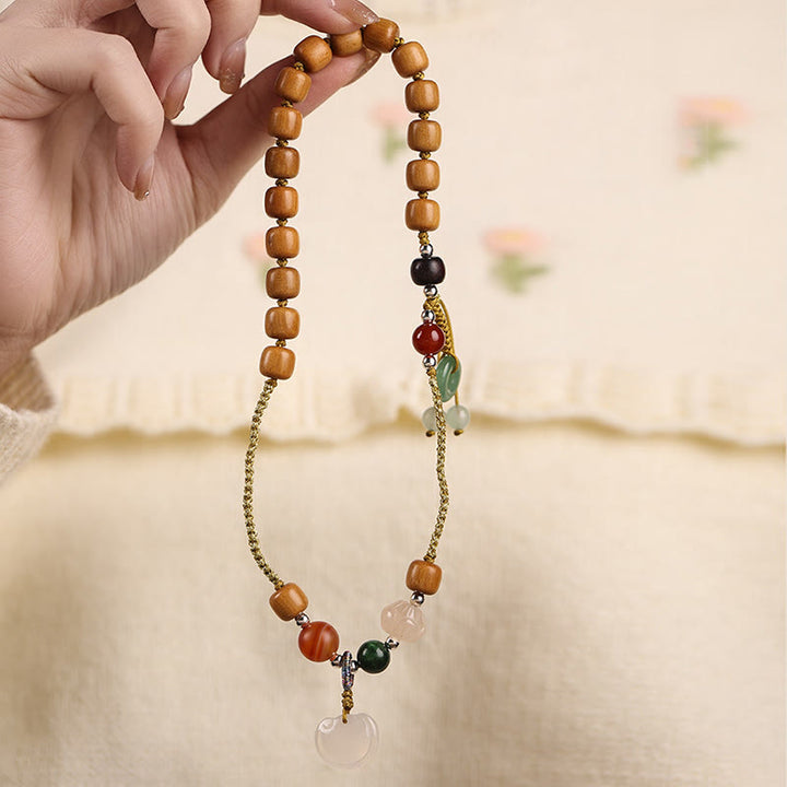 Pulsera relajante de doble vuelta con dije de hebilla de paz y calcedonia de sándalo verde con Buddha Stones