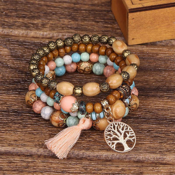 Pulsera curativa con borlas de árbol en capas de madera de wengué