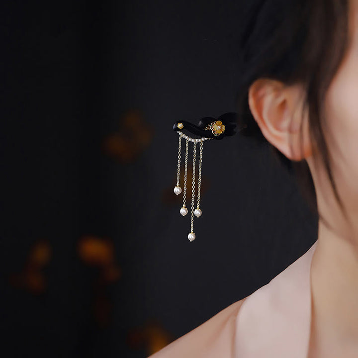Horquilla con borlas de perlas y flores amarillas de madera de ébano con Buddha Stones