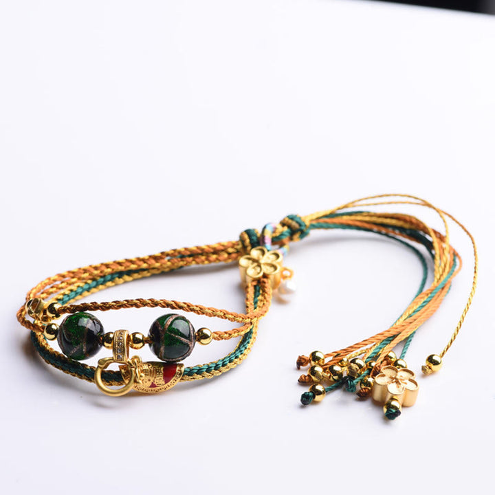 Pulsera curativa multicapa trenzada con cuentas de vidrio Liuli de cuerda hecha a mano tibetana con Buddha Stones