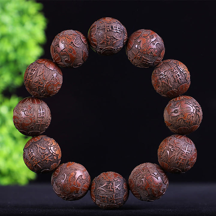 Pulsera de calidez tallada con monedas de cobre, ébano y palisandro del zodiaco chino con Buddha Stones y Pixiu