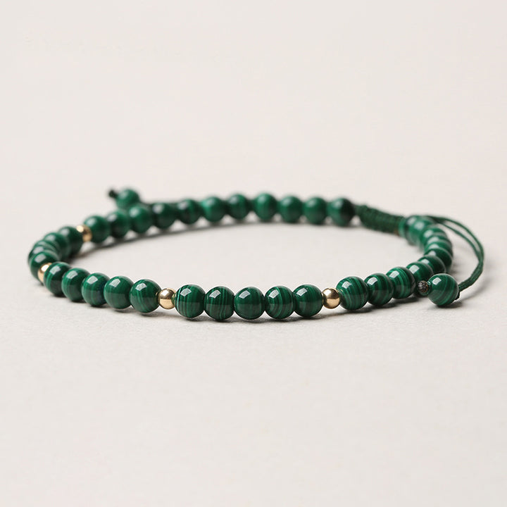 Pulsera de hilo de calma y protección de malaquita natural con Buddha Stones
