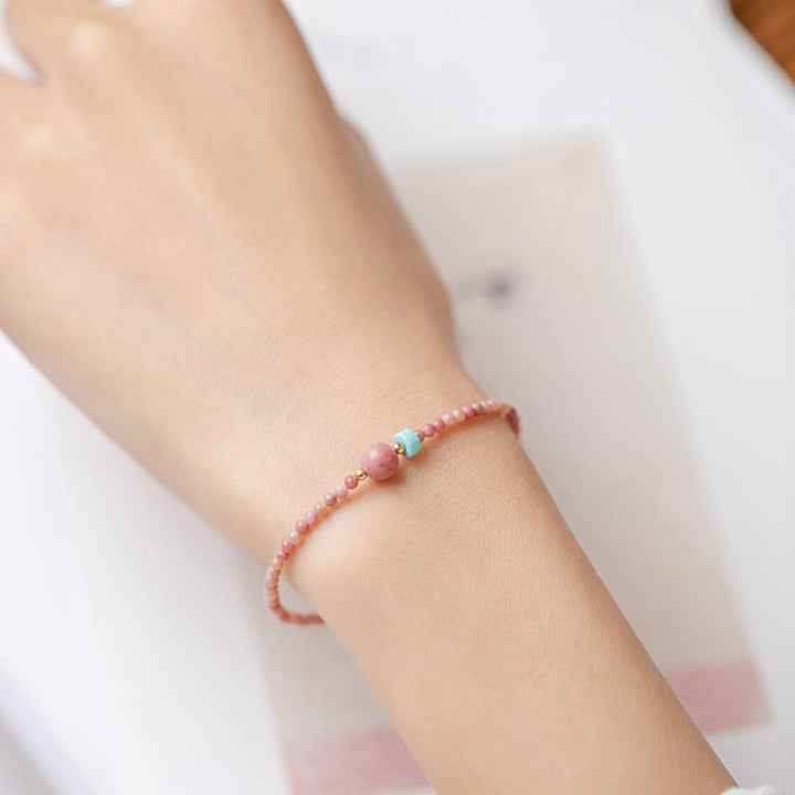 Pulsera de cadena de energía amorosa de rodonita natural chapada en oro de 14 quilates con Buddha Stones