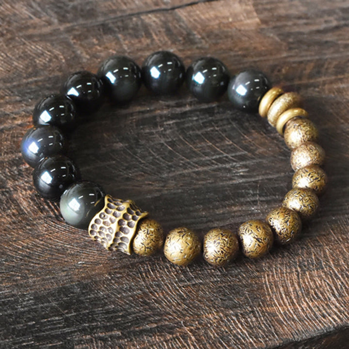 Pulsera de transformación positiva con cuentas de cobre y obsidiana arcoíris de Buddha Stones